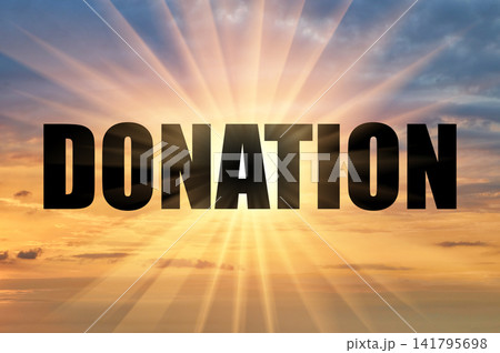 Donation text against bright sun rays in morning sky 141795698