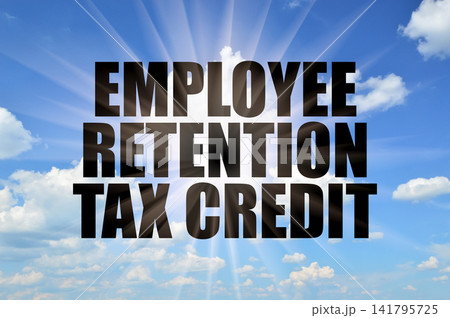 Employee Retention Tax Credit Concept on Bright Day Sky with Rays Employee Retention Tax Credit Concept on Bright Day Sky with Rays 141795725