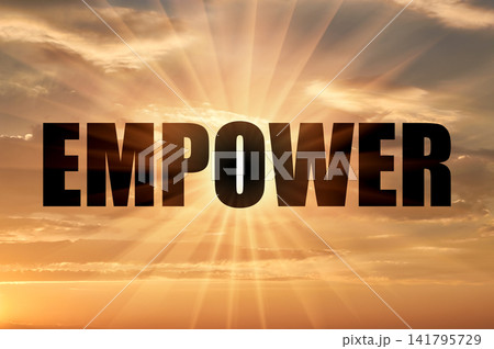 Empower Concept Written on Golden Evening Sky with Glowing Rays Empower Concept Written on Golden Evening Sky with Glowing Rays 141795729
