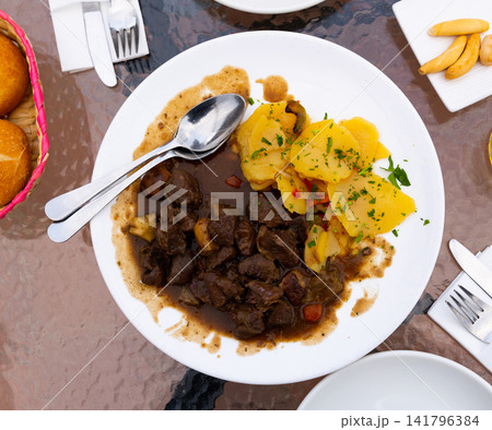 Venison ragout with port wine, thyme and mushroom aroma. Traditional dish of Toledo Venison ragout with port wine, thyme and mushroom aroma. Traditional dish of Toledo 141796384