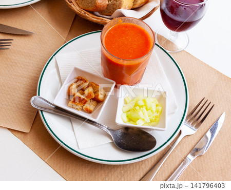 Refreshing tomato pureed soup Gazpacho with toasted bread and cucumbers Refreshing tomato pureed soup Gazpacho with toasted bread and cucumbers 141796403
