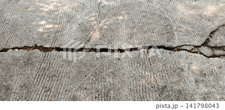 Surface texture of cracked concrete pavement 141798043