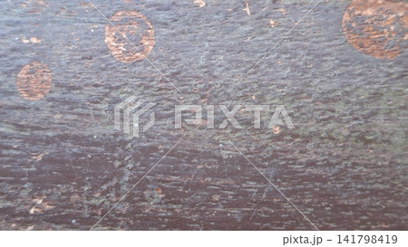 Weathered Dark Surface Texture with Circular Stains and Grunge Details 141798419