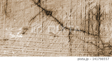 Concrete texture with warm sepia tones, featuring diagonal cracks and a grid-line pattern. Concrete texture with warm sepia tones, featuring diagonal cracks and a grid-line pattern. 141798557