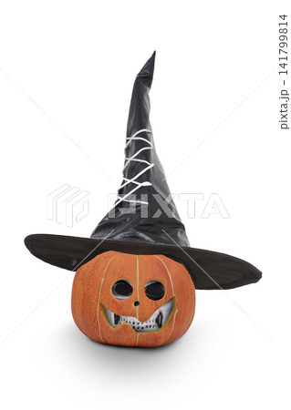 A pumpkin head with a skull inside wearing a black witch's hat. A pumpkin head with a skull inside wearing a black witch's hat. 141799814