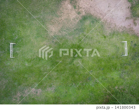 Aerial view field nature green soccer field background, top view football field from above in the countryside, Bird eye view futsal field  with goal 141800343