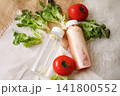 Top View of Fresh Tomato Juice and Infused Water Bottles with Vegetables for Healthy Lifestyle, Detox Drink and Nutrition Concept, beverage branding, restaurant menus, recipe books, nutrition articles 141800552