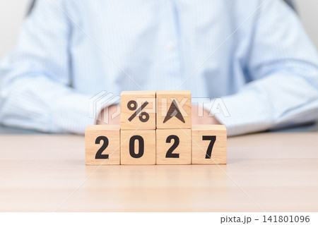 2027 New year with percentage change to UP and Down arrow. Interest rate, GDP, stocks market, financial, deflation and Inflation, mortgage, debt, Loan and Economic Recession 141801096