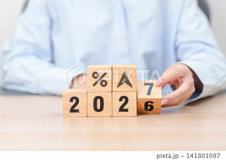 2027 New year with percentage change to UP and Down arrow. Interest rate, GDP, stocks market, financial, deflation and Inflation, mortgage, debt, Loan and Economic Recession 141801097