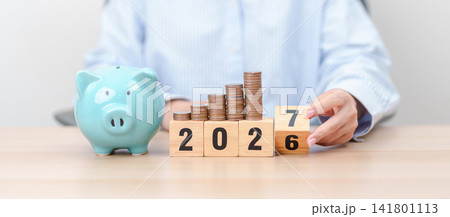 Happy New Year 2027 with piggy bank. Resolution, Goals, Plan, Action, Money Saving, Retirement fund, Pension, Investment and Financial concepts Happy New Year 2027 with piggy bank. Resolution, Goals, Plan, Action, Money Saving, Retirement fund, Pension, Investment and Financial concepts 141801113