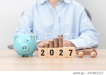 Happy New Year 2027 with car model and Coins Money stack for deposit and Automobile Tax. Money Saving, Car Insurance, Financial, vehicle Repair and Maintenance and New Year concept Happy New Year 2027 with car model and Coins Money stack for deposit and Automobile Tax. Money Saving, Car Insurance, Financial, vehicle Repair and Maintenance and New Year concept 141801117
