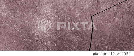 Cracked concrete surface texture with pinkish hues. Cracked concrete surface texture with pinkish hues. 141801522