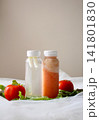 Two Bottles of Fresh Tomato Juice with Tomatoes and Lettuce for Healthy Beverage, Food Packaging and Nutrition Concept, beverage packaging, food branding, restaurant menus, recipe books 141801830