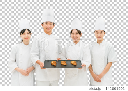 Chefs and cooks in chef coats standing in the kitchen Chefs and cooks in chef coats standing in the kitchen 141801901