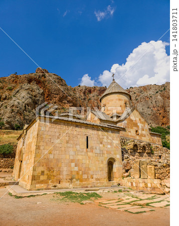 Armenian Noravank church carved into mountainous landscape Armenian Noravank church carved into mountainous landscape 141803711