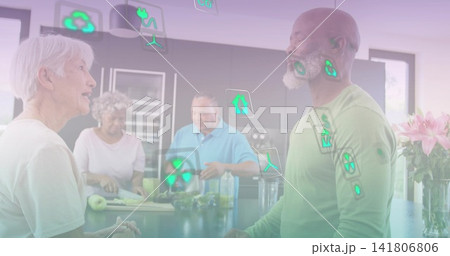 Gathering four adults in casual clothing, cooking and talking at kitchen island, with energy icons Gathering four adults in casual clothing, cooking and talking at kitchen island, with energy icons 141806806