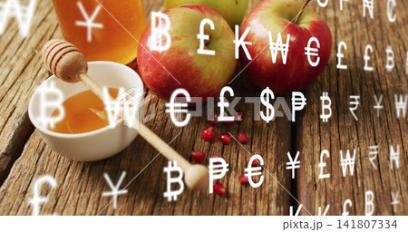 Showing 3 red-green apples bowl jar dipper pomegranate seeds on rustic table, overlaid currency Showing 3 red-green apples bowl jar dipper pomegranate seeds on rustic table, overlaid currency 141807334