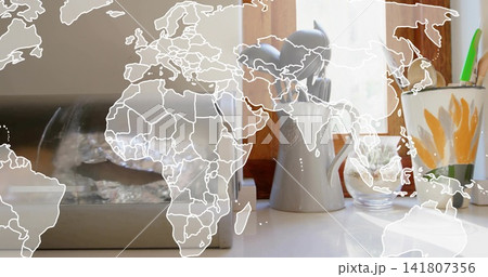 Displaying white pitcher sitting on kitchen sill with glass, floral mug, metal box, map overlay Displaying white pitcher sitting on kitchen sill with glass, floral mug, metal box, map overlay 141807356