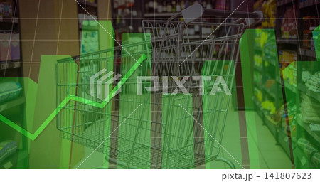 Sitting metal shopping cart occupying center aisle, showing stocked shelves and green graph overlay 141807623