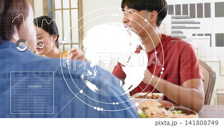 Talking red-shirted man gesturing while eating at wooden dining table with AR overlays, copy space 141808749