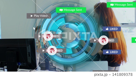 Demonstrating team red hair woman and suited man engaging with hologram UI at office showing badges 141809378