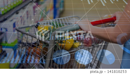 Woman in short-sleeve top pushing cart down store aisle with pineapple citrus red rect data overlay 141810253