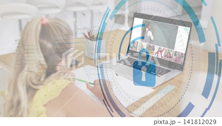 Writing girl in yellow sleeveless taking notes at home desk with laptop, green pencil, padlock icon Writing girl in yellow sleeveless taking notes at home desk with laptop, green pencil, padlock icon 141812029