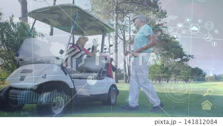 Gesturing man talking to woman wearing pink-polo in cart on fairway, with clubs AR-HUD Gesturing man talking to woman wearing pink-polo in cart on fairway, with clubs AR-HUD 141812084