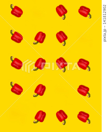 collage of sweet red peppers on a yellow background 141812902