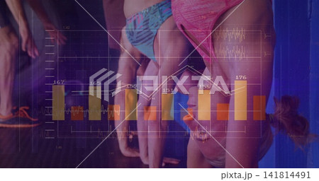 Doing four athletes in sportswear in handstand against blue padded wall at gym, with data charts Doing four athletes in sportswear in handstand against blue padded wall at gym, with data charts 141814491