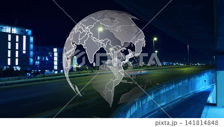 Hovering translucent globe overlay glowing above nighttime freeway, with curved ramp, light trails Hovering translucent globe overlay glowing above nighttime freeway, with curved ramp, light trails 141814848