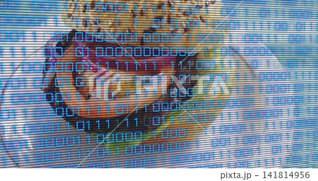 Showing bearded face wearing gold crown and green-gold robe on screen with blue binary scanlines Showing bearded face wearing gold crown and green-gold robe on screen with blue binary scanlines 141814956