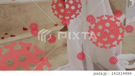 Standing woman wrapped in white robe at spa steps, with rose petals, virus overlays, copy space Standing woman wrapped in white robe at spa steps, with rose petals, virus overlays, copy space 141814994