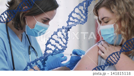 Administering nurse giving injection to patient at clinic masked sleeveless holding syringe DNA Administering nurse giving injection to patient at clinic masked sleeveless holding syringe DNA 141815118