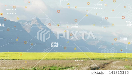 Showing bright yellow canola field stretching across rural valley with fence posts and HUD overlays 141815356
