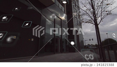 Showing modern office building facade reflecting overcast sky on sidewalk, with floating AR icons 141815388