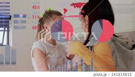 Discussing, two women wearing denim jacket white tee and yellow top comparing pie charts in lounge 141815615