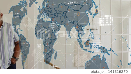 Showing glass world map projecting data at stair, with man left wearing striped shirt, watch 141816270