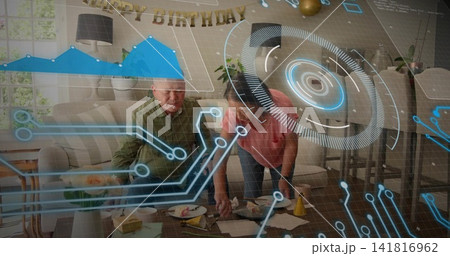 Leaning son in green shirt arranging cake with mother in pink living room table, holographic HUD Leaning son in green shirt arranging cake with mother in pink living room table, holographic HUD 141816962