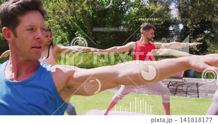 Stretching man in blue tanktop performing yoga pose on lawn beside deck, HUD overlays, copy space Stretching man in blue tanktop performing yoga pose on lawn beside deck, HUD overlays, copy space 141818177