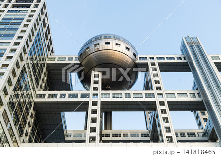 View of the Fuji Television Headquarters Building in Odaiba, Koto, Tokyo, Japan. The spherical part of the building is the observation room. View of the Fuji Television Headquarters Building in Odaiba, Koto, Tokyo, Japan. The spherical part of the building is the observation room. 141818465