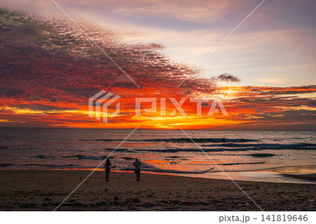 Time lapse Stunning Coastal Sunset PanoramaSerene Beach with Colorful Clouds 141819646