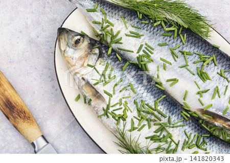 Salted herring with dill and green onion Salted herring with dill and green onion 141820343