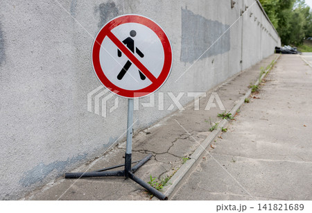 Portable no pedestrians traffic sign on metal stand Portable no pedestrians traffic sign on metal stand 141821689
