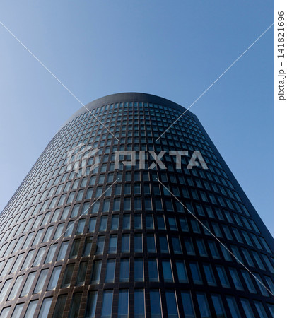 modern office building against blue sky. modern office building against blue sky. 141821696