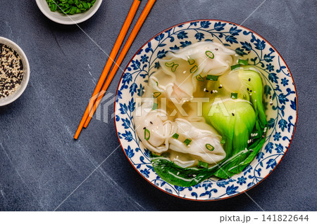 Soup with wontons and bok choy Soup with wontons and bok choy 141822644