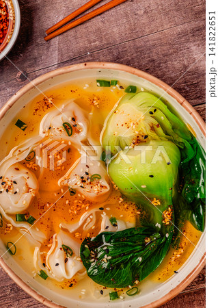Soup with wontons and bok choy Soup with wontons and bok choy 141822651