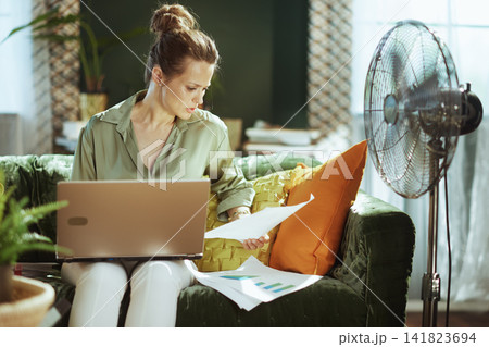 Productive Remote Worker Analyzing Data at Home Productive Remote Worker Analyzing Data at Home 141823694