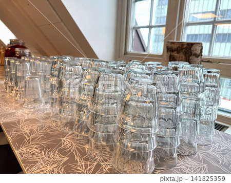 Clean glass tumblers arranged upside down on countertop Clean glass tumblers arranged upside down on countertop 141825359