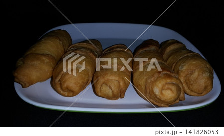 Molen banana shot from above. Indonesian loves to make a dessert with a banana in many styles, and this is one of their famous street food snacks. 141826053
